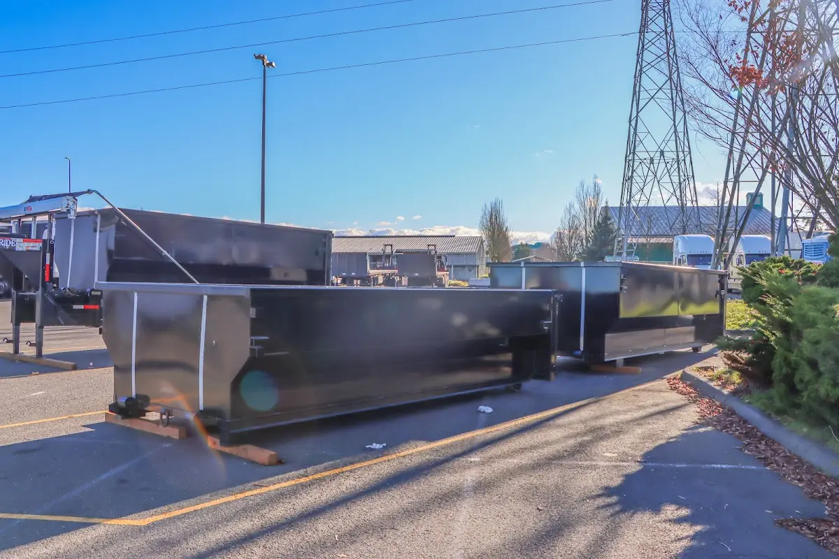 Roll-off dumpster ready for waste disposal at job site for Construction Dumpster Rental in Providence
